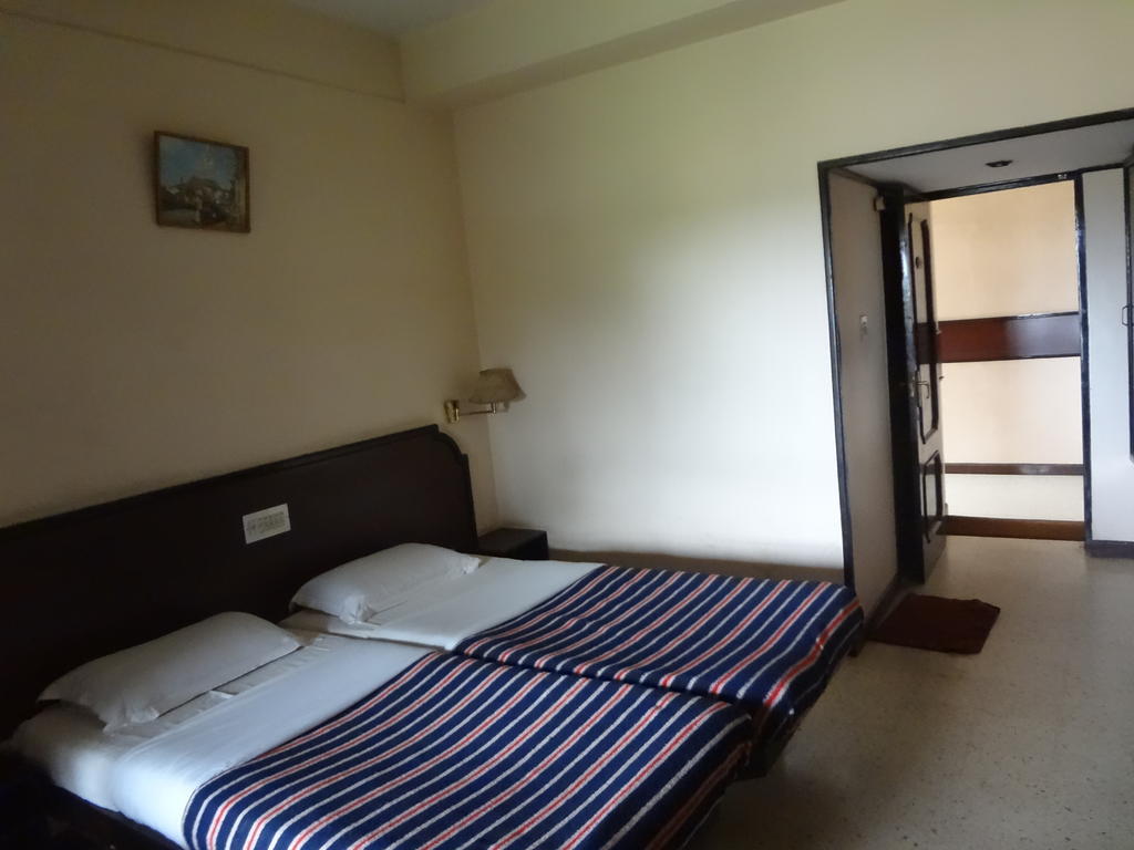 Hotel New Rajdarshan Madikeri Habitación foto